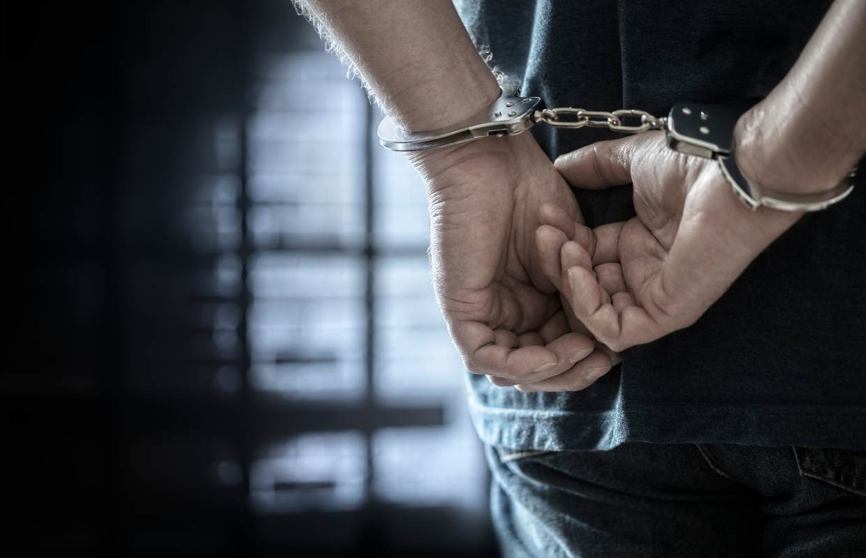 Handcuffed male