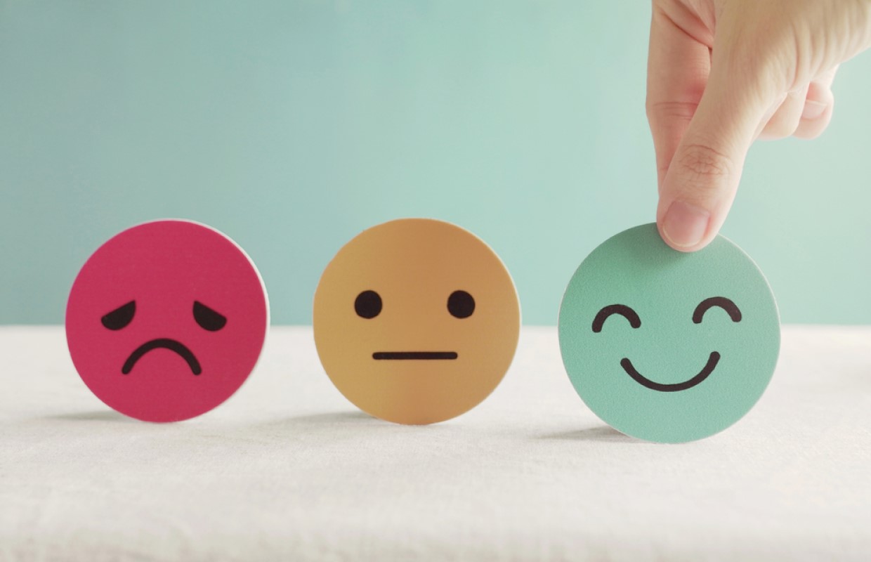 Round circles with drawings of facial expressions