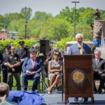 Retired Chicago police officer Mike Ostrowski speaks to the crowd at the annual Police Officers Memorial in Springfield on Thursday. “Their names are etched in a wall behind me,” he said of the state’s officers who died in the line of duty. “But their spirit is etched in our souls.”