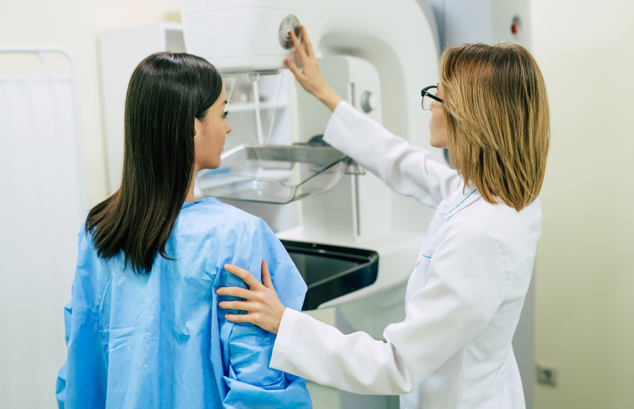 Woman receiving mammogram