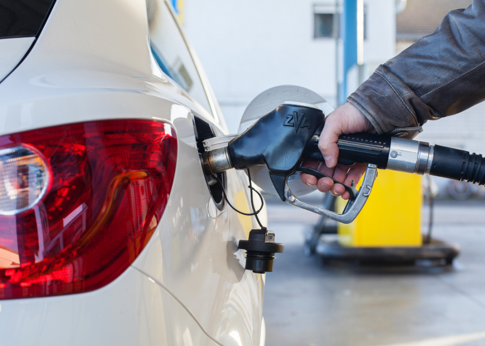 Motorist pumping gas