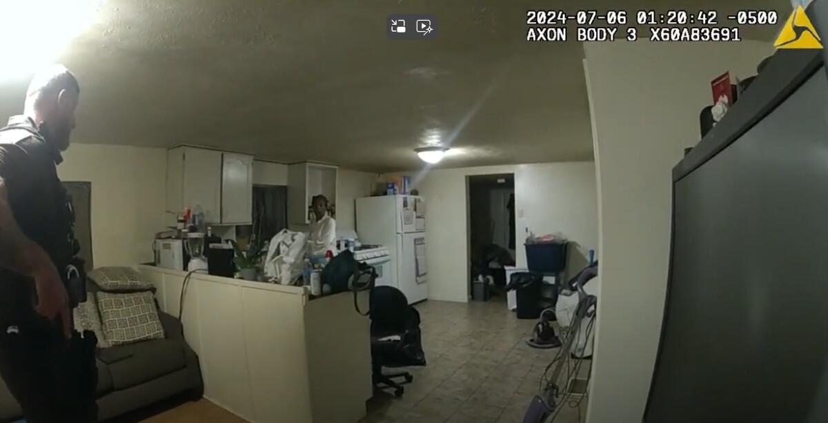 Sonya Massey in her kitchen on bodycam footage