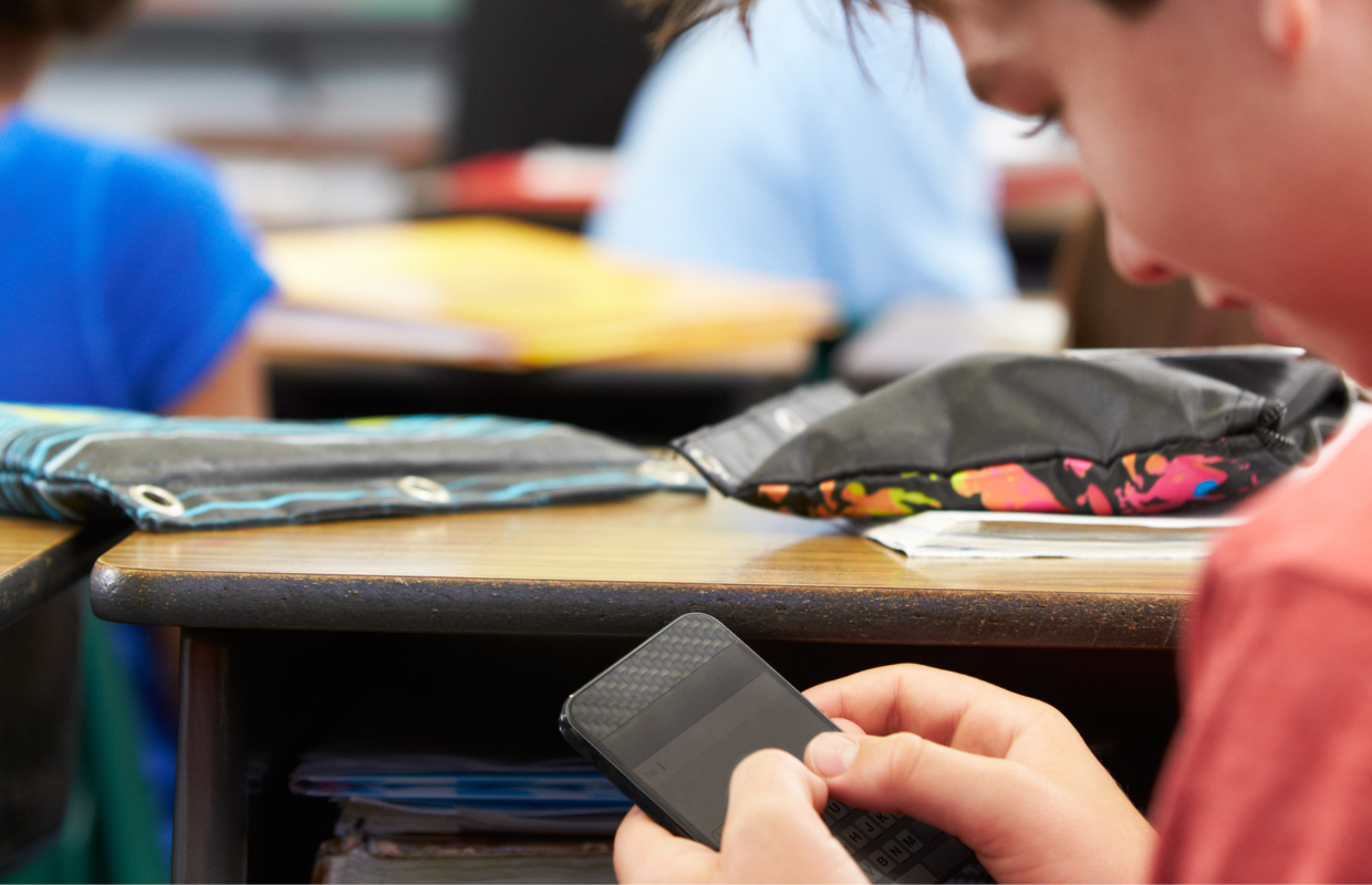 student on cell phone