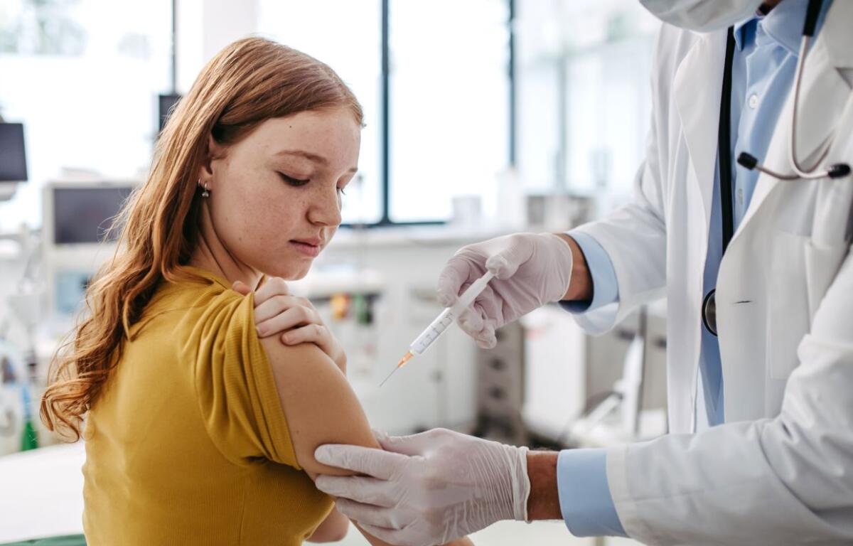 woman receiving vaccine