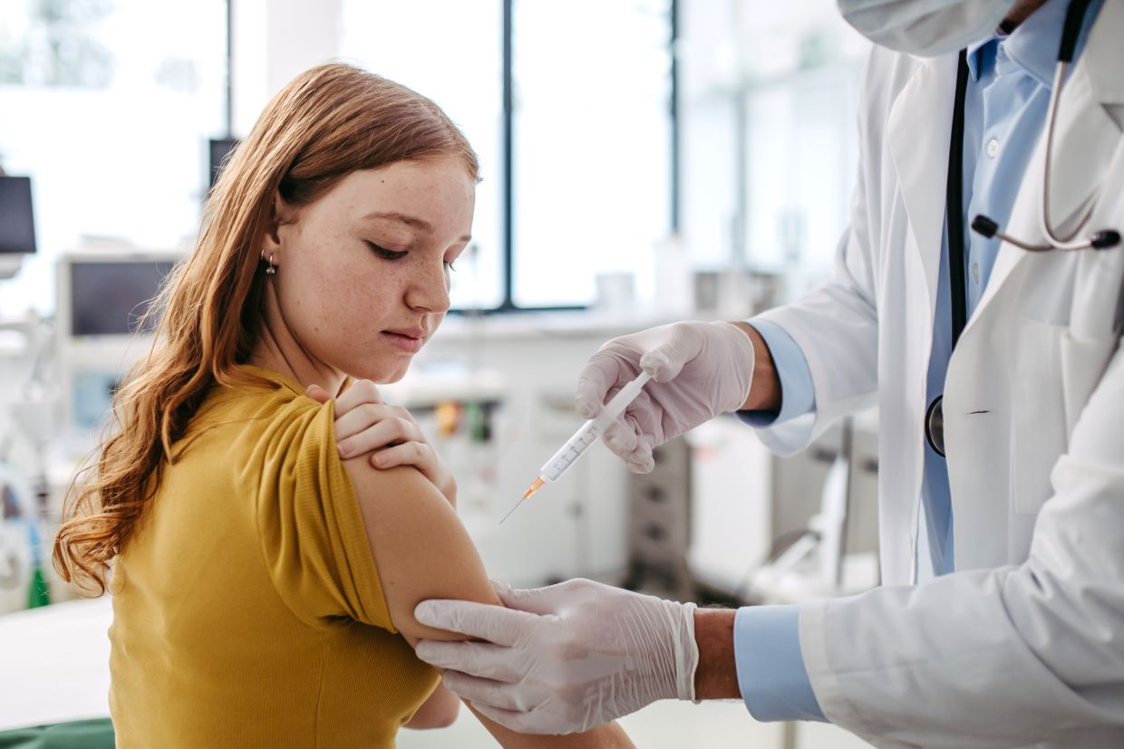 woman receiving vaccine