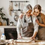 A mother and daughter cooking.