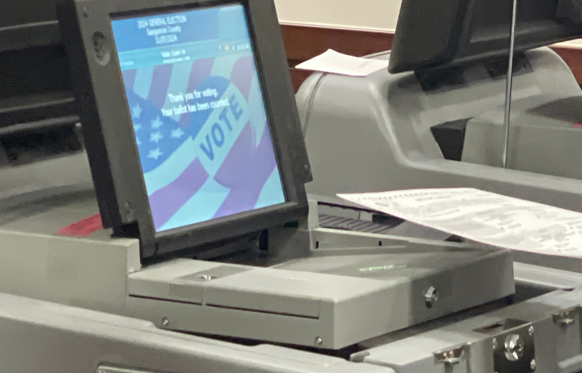 Ballots begin fed into voting machines at election office