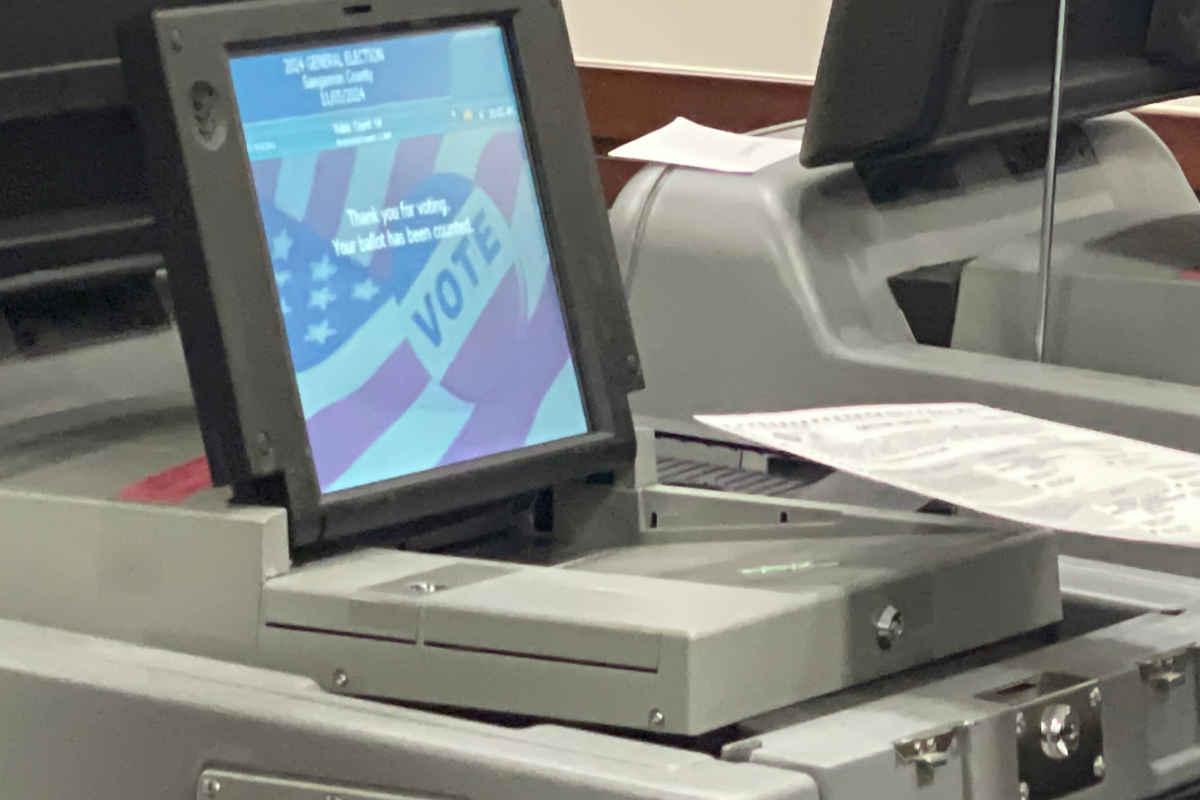 Ballots begin fed into voting machines at election office