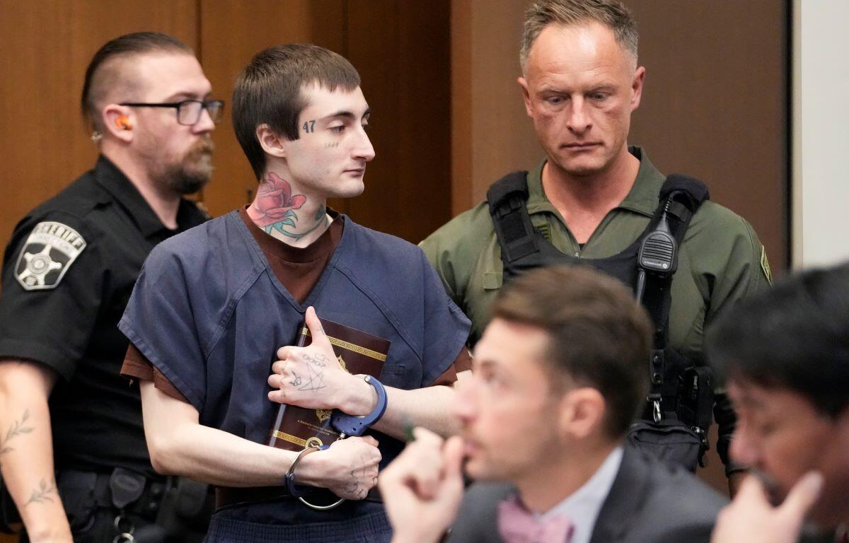 Robert E. Crimo III, arrives before Judge Victoria A. Rossetti during a case management and ruling on motions at the Lake County Courthouse, Waukegan, Ill., Wednesday, Dec. 18, 2024.
