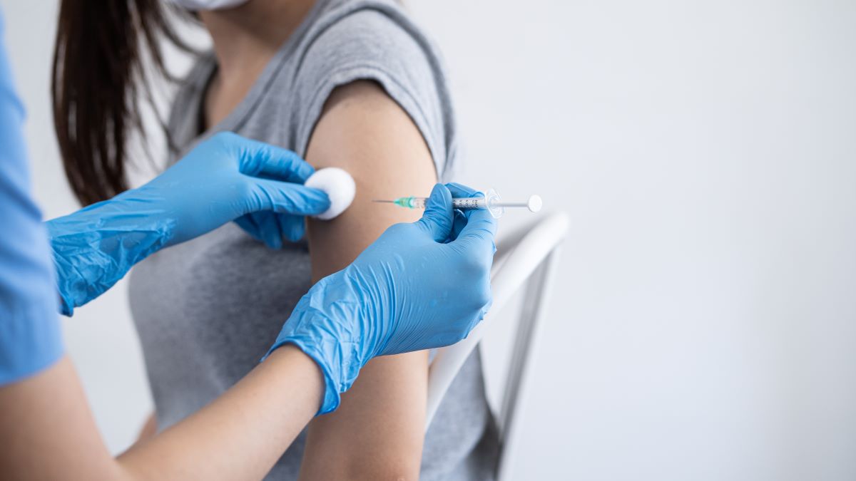 Woman about to receive immunization