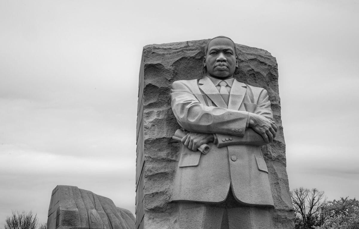 Black and white of Lei Yixin's granite statue “The Stone of Hope”, part of the Martin Luther King, Jr. Memorial. a national memorial located in West Potomac Park.