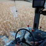 Farmer working in corn field during cold weather