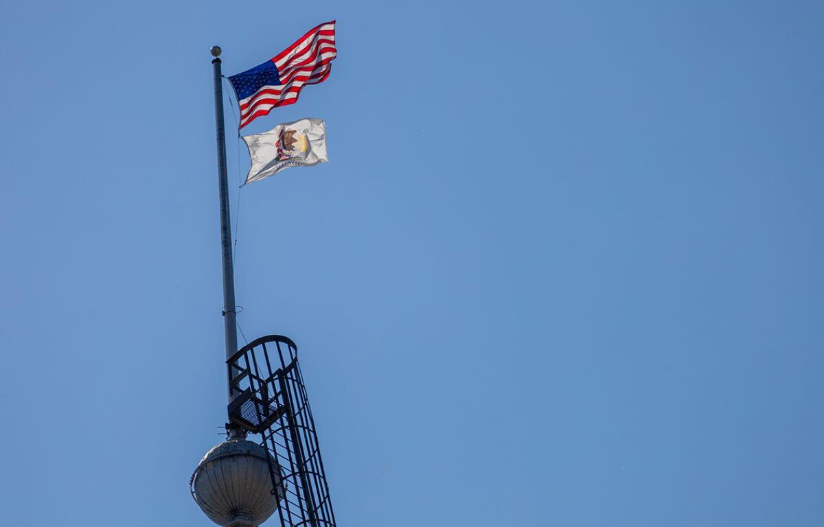 Flags flying at Illinois Capitol