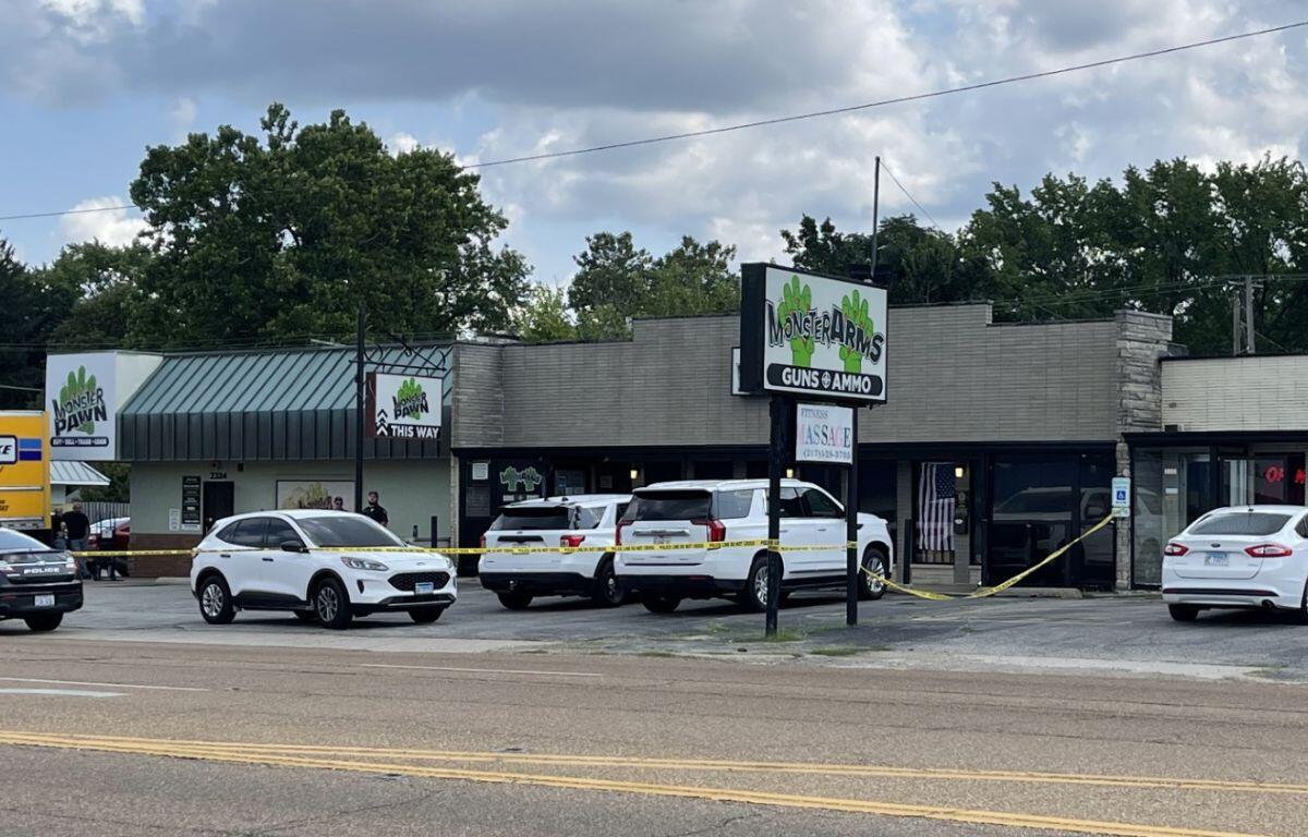 Law enforcement vehicles outside of Monster Pawn on MacArthur Blvd. on July 23, 2024