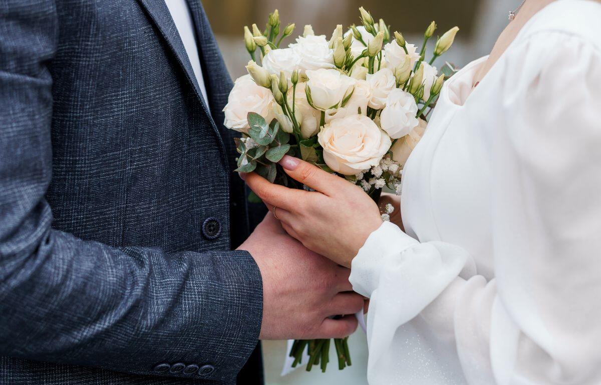 bride and groom with bouquet