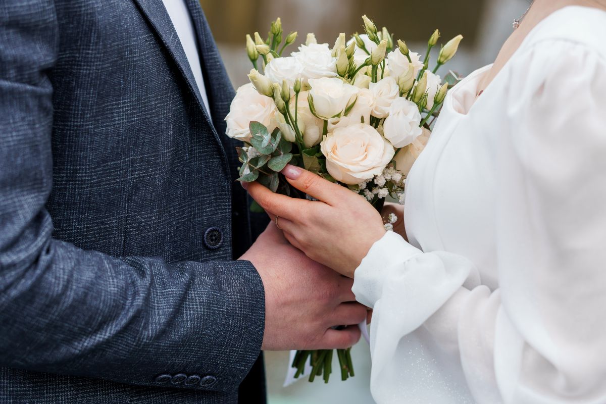 bride and groom with bouquet