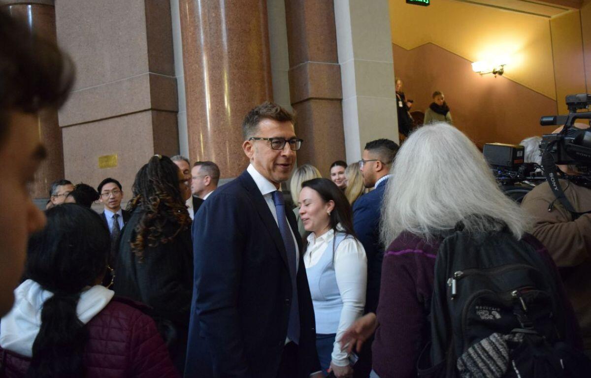 Illinois Secretary of State Alexi Giannoulias exits the House chambers in the Illinois Capitol. (Capitol News Illinois photo by Jade Aubrey)