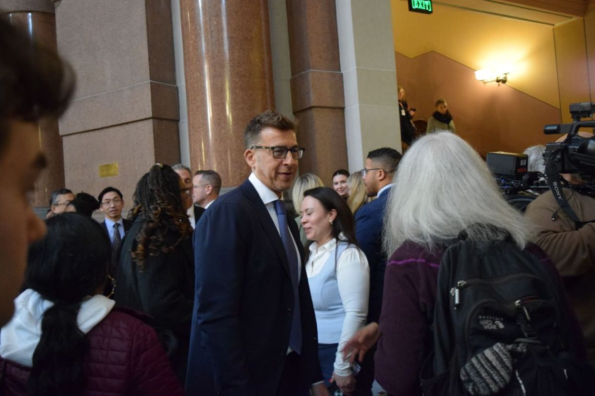 Illinois Secretary of State Alexi Giannoulias exits the House chambers in the Illinois Capitol. (Capitol News Illinois photo by Jade Aubrey)