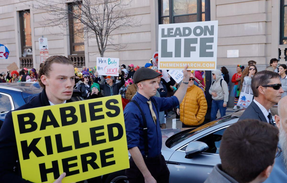 Boston, Massachusetts USA - November 16, 2024: Hundreds of counter protesters clash with police at anti-abortion demonstration in Boston