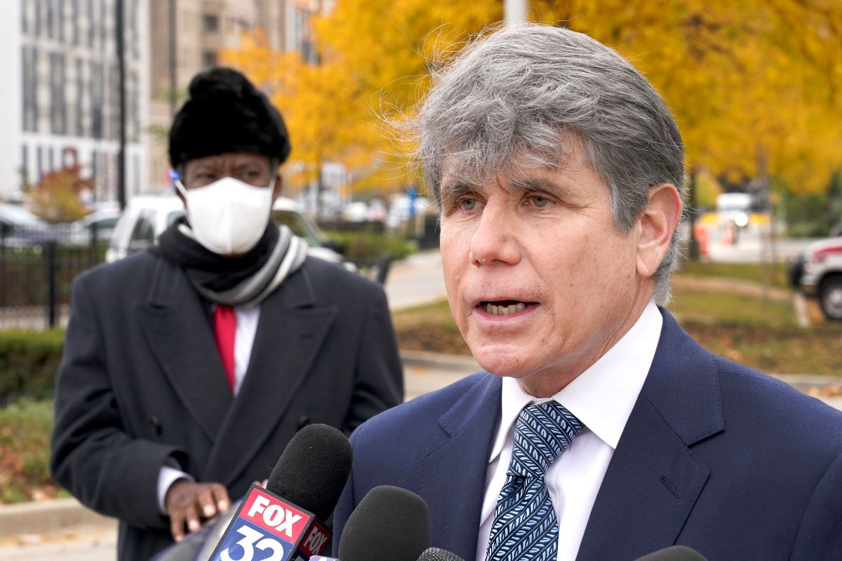Former Illinois Gov. Rod Blagojevich, right, speaks, Oct. 21, 2020, during a news conference in Chicago. (AP Photo/Charles Rex Arbogast, File)