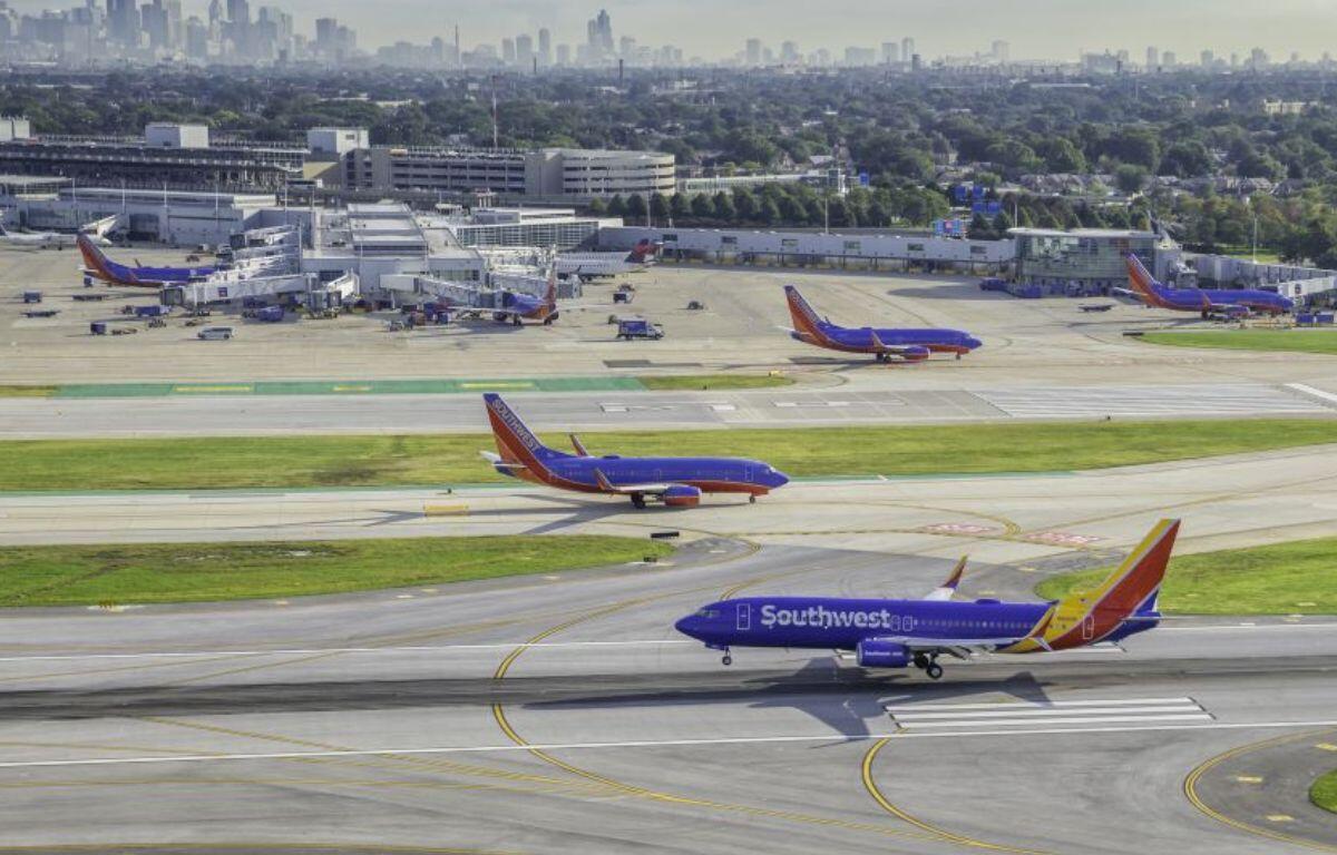 CHICAGO, UNITED STATES - SEPTEMBER 2015: Commercial Southwest Airlines jet landing on Chicago Midway Airport. Midway is second largest airport in Chicago, United States.