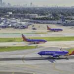 CHICAGO, UNITED STATES - SEPTEMBER 2015: Commercial Southwest Airlines jet landing on Chicago Midway Airport. Midway is second largest airport in Chicago, United States.