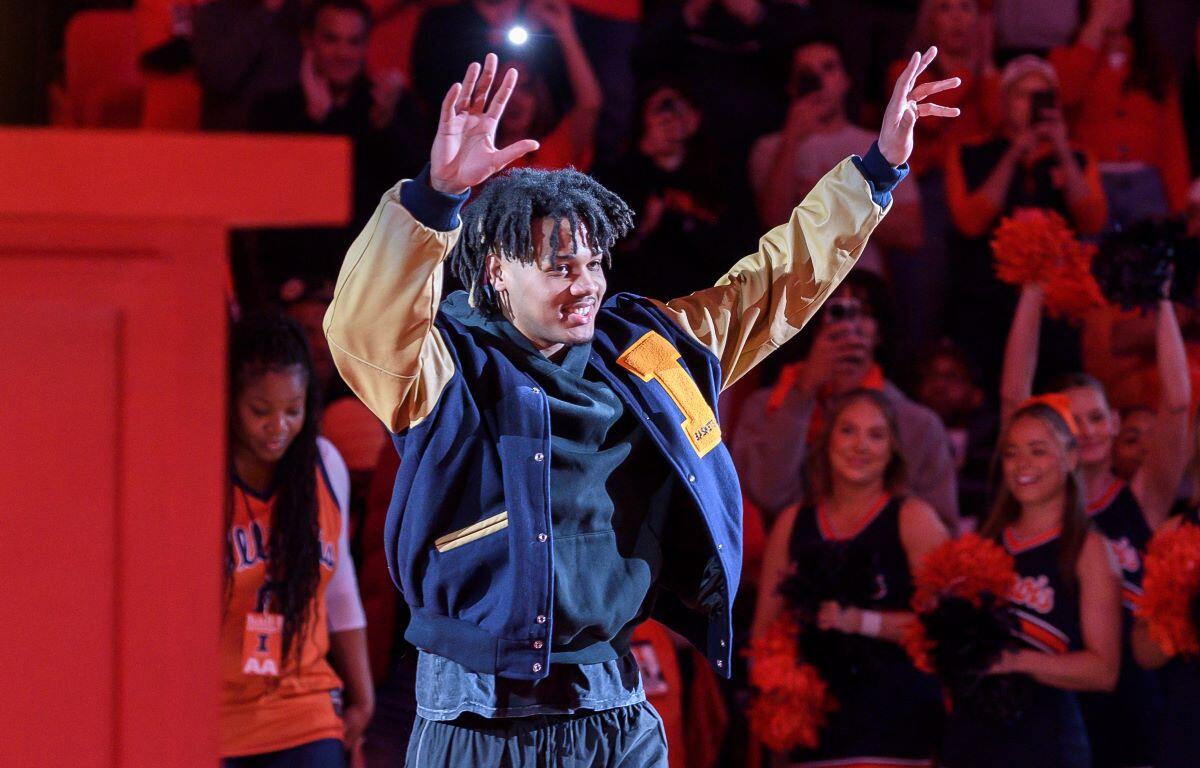 Former Illinois player Terrence Shannon Jr. is introduced to the crowd to honor his jersey number during an NCAA college basketball game against Michigan State, Saturday, Feb. 15, 2025, in Champaign, Ill. (AP Photo/Craig Pessman)