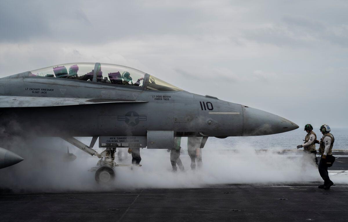 F/A-18F Super Hornet fighter jet takes off from the aircraft carrier U.S.S. Dwight D. Eisenhower, also known as the 'IKE', in the south Red Sea, Tuesday, Feb. 13, 2024. (AP Photo/Bernat Armangue, File)