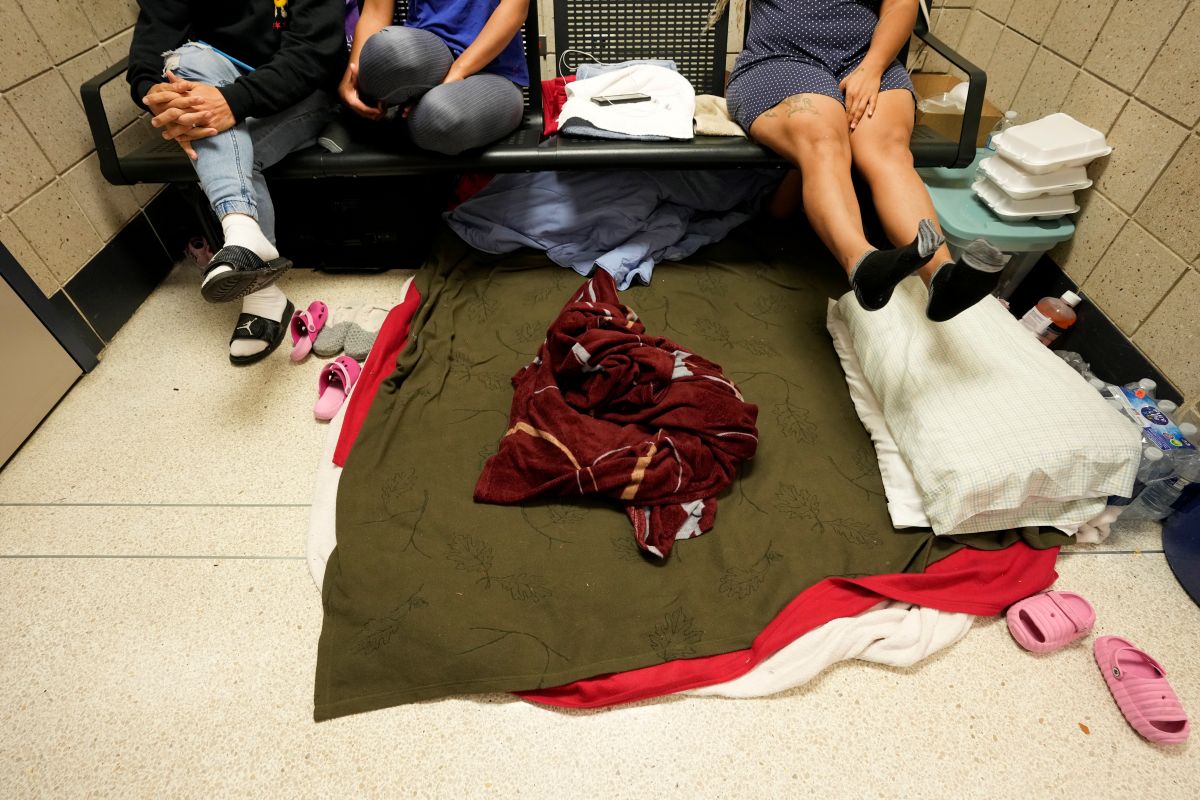 Migrants from Venezuela take shelter in the Chicago Police Department's 16th District station, May 1, 2023