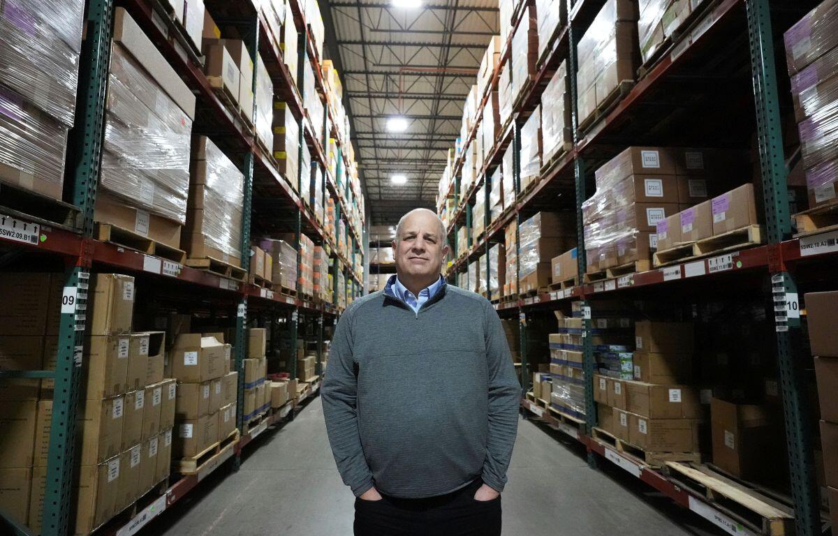 Rick Woldenberg, CEO of Learning Resources, an educational toy company whose products are manufactured in China, stands at a warehouse in Vernon Hills, Ill., Friday, April 11, 2025. (AP Photo/Nam Y. Huh)
