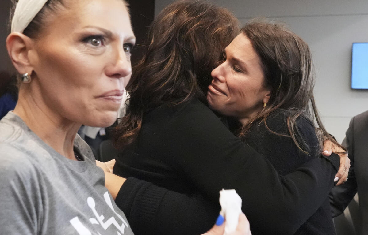 Victims, Keely Roberts, left, Sheila Gutman, center, and Dana Ruder Ring react during the sentencing hearing for Robert E. Crimo III., at the Lake County Courthouse, in Waukegan, Ill., Wednesday, April 23, 2025. (AP Photo/Nam Y. Huh, Pool)