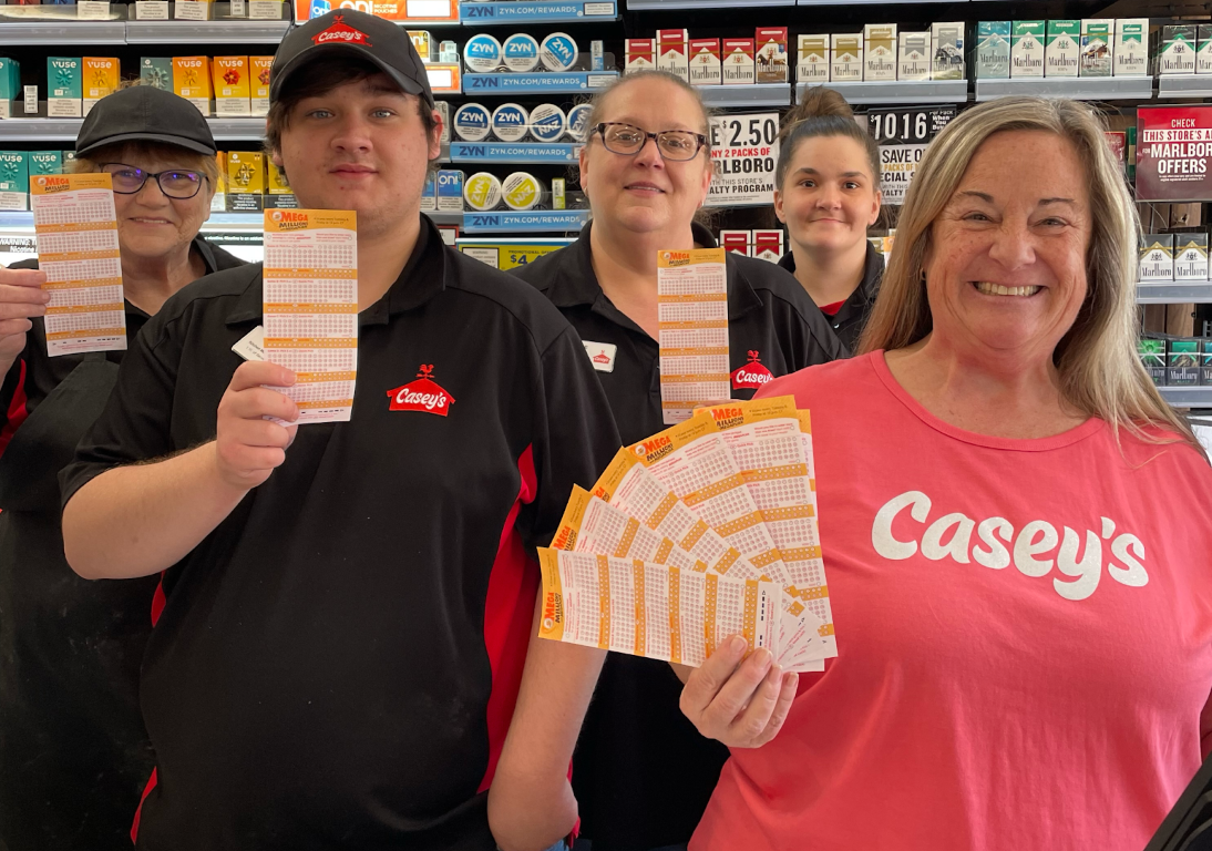 Casey's staff hold lottery tickets