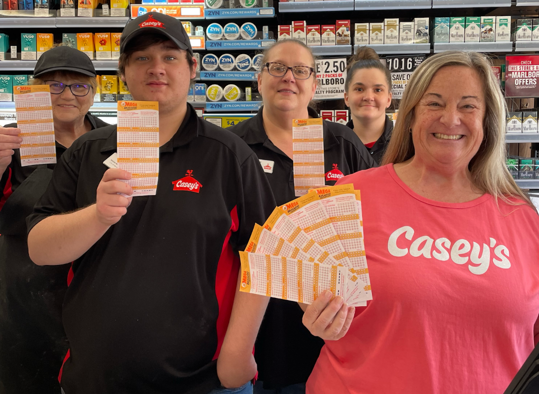 Casey's staff hold lottery tickets