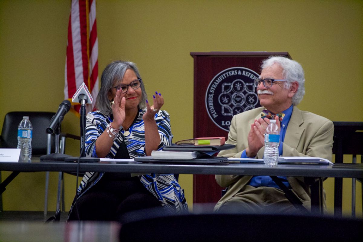 U.S. Rep. Robin Kelly is pictured in her final state central committee meeting as Democratic Party of Illinois chair in 2022. At the time, she was unseated by state Rep. Lisa Hernandez, Gov. JB Pritzker’s preferred candidate for party chair. She’s pictured alongside then-party treasurer Michael Dorf. (Capitol News Illinois photo by Jerry Nowicki)