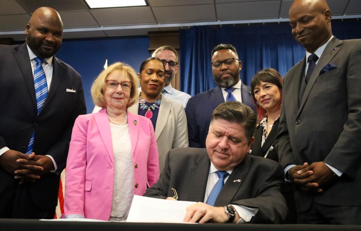 Gov. JB Pritzker signs Illinois’ fiscal year 2026 budget on June 16, outlining $55.1 billion in state spending. (Capitol News Illinois photo by Andrew Adams)