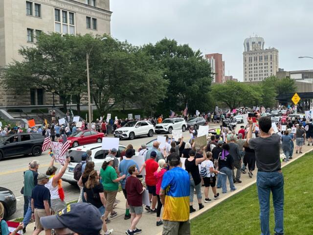 "No Kings" rally goers march from the State Capitol to the Old State Capitol. (Will Stevenson)