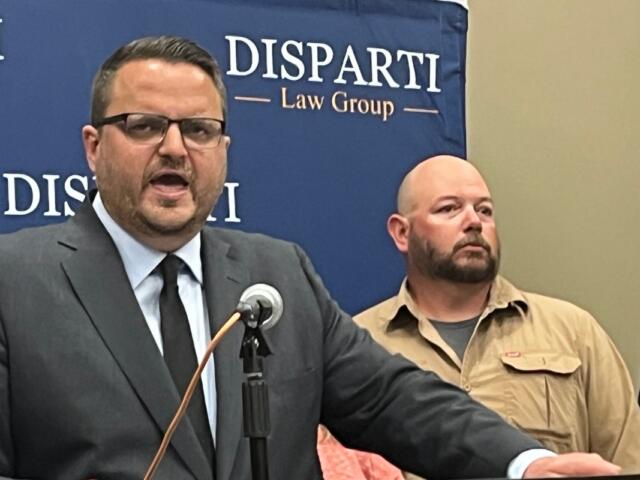 Cass Casper, attorney, speaks at a news conference Tuesday in Springfield. (Dave Dahl)