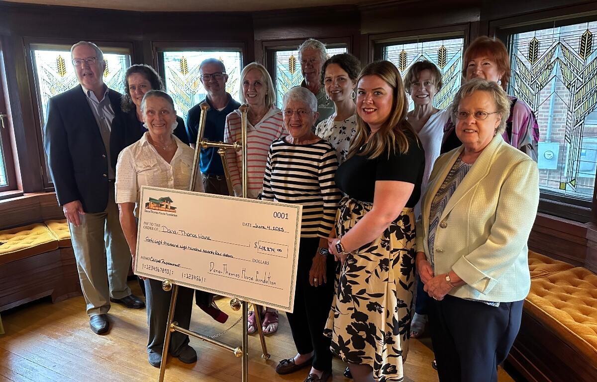 The Dana-Thomas House Foundation makes a more than $48,000 donation to the Illinois Conservation Foundation for use in the house.