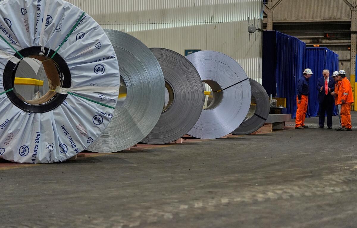 FILE - President Donald Trump talks to workers as he tours U.S. Steel Corporation's Mon Valley Works-Irvin plant, Friday, May 30, 2025, in West Mifflin, Pa. (AP Photo/Julia Demaree Nikhinson, File)