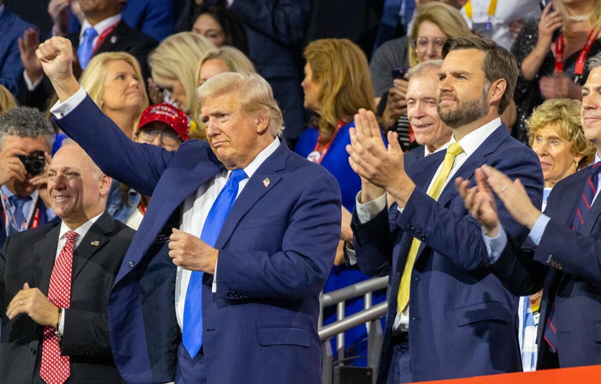 President Donald Trump raises his fist at the Republican National Convention in Milwaukee last year alongside U.S. Rep. Steve Scalise (left) and then-running mate J.D. Vance (right). His largest domestic policy bill, which makes drastic cuts to Medicaid, appeared poised to become law this week. (Capitol News Illinois photo by Andrew Adams)