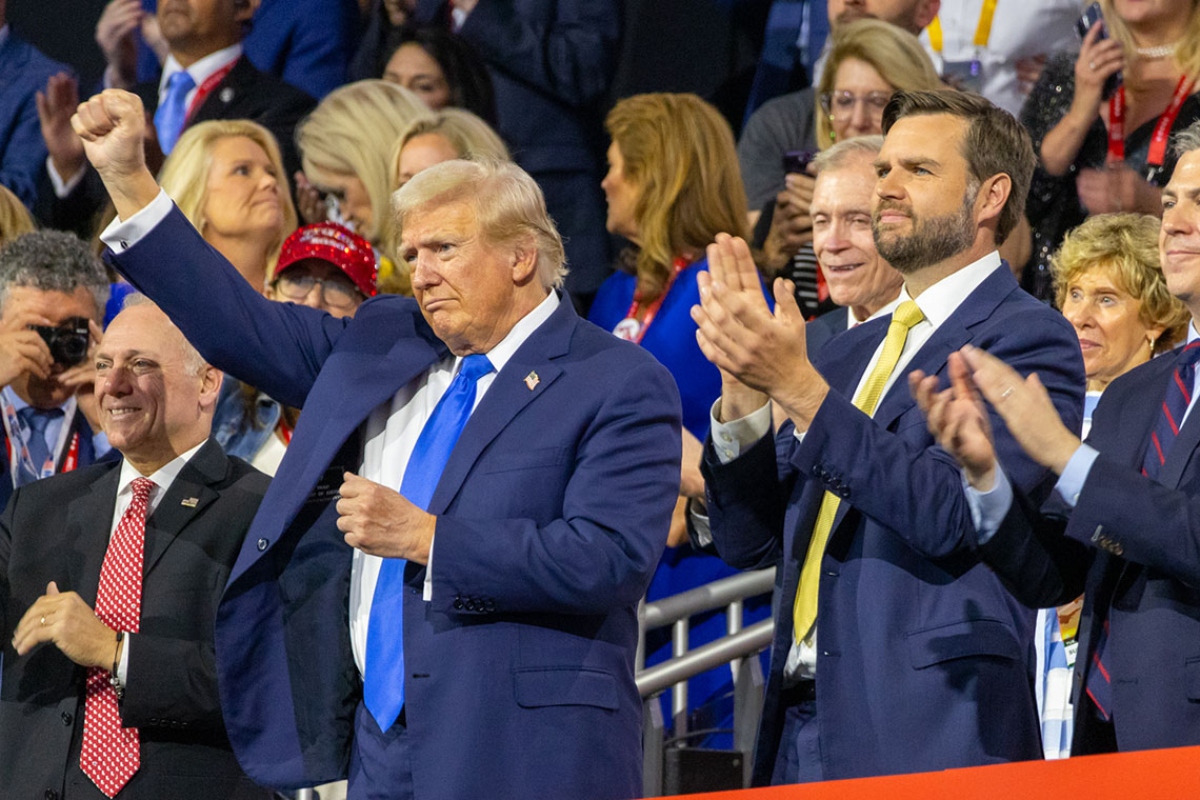President Donald Trump raises his fist at the Republican National Convention in Milwaukee last year alongside U.S. Rep. Steve Scalise (left) and then-running mate J.D. Vance (right). His largest domestic policy bill, which makes drastic cuts to Medicaid, appeared poised to become law this week. (Capitol News Illinois photo by Andrew Adams)