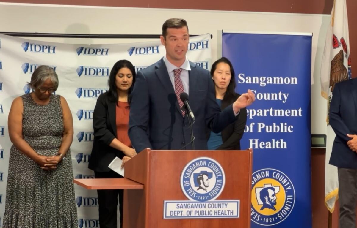 Ryan Croke, First Assistant Deputy Governor for Health and Human Services, speaks at a news conference in Springfield.
