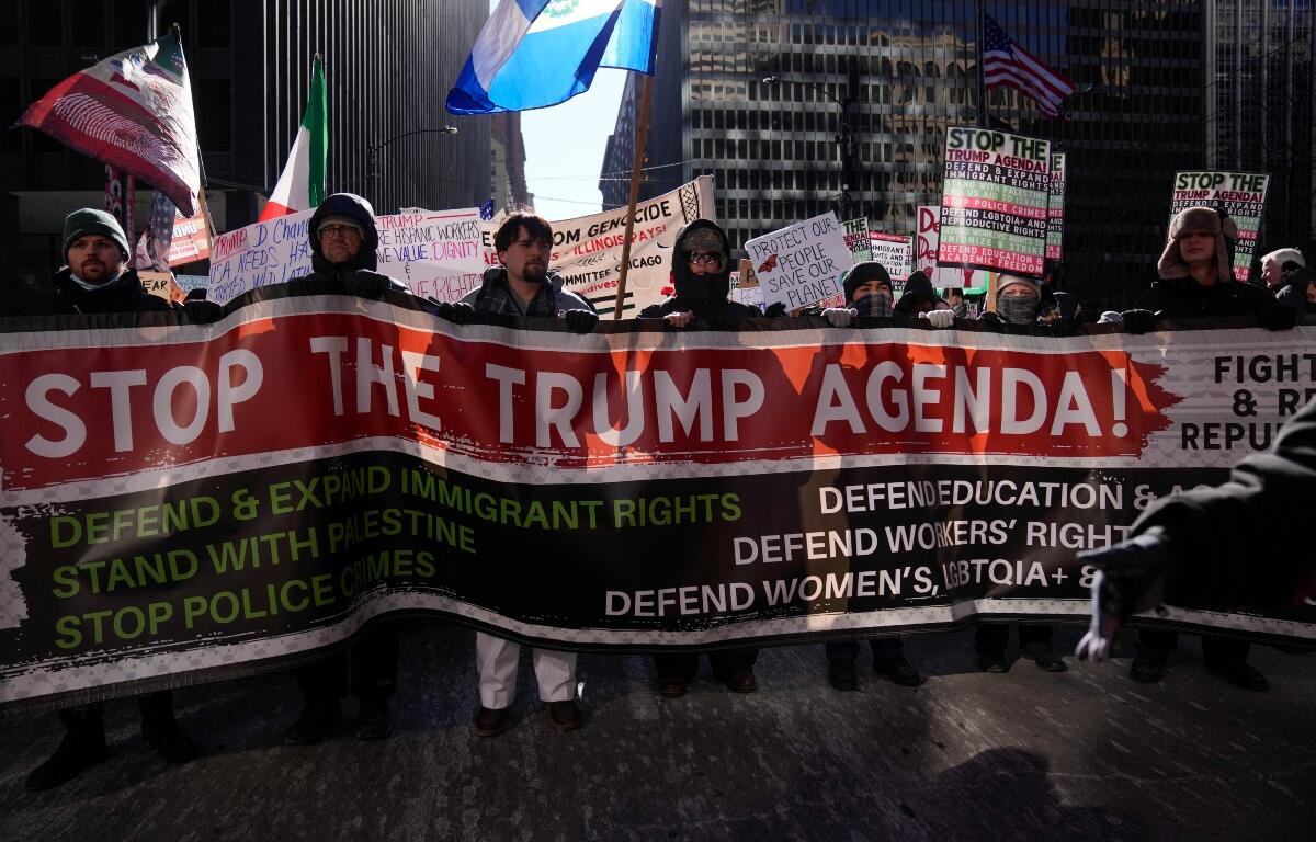 FILE - Anti-Trump protesters march to Trump Tower as they rally for a number of issues, including immigrant rights, the Israel-Hamas war, women's reproductive rights, racial equality and others, on the day of President Trump's Inauguration, Monday, Jan. 20, 2025, in Chicago. (AP Photo/Erin Hooley,File)