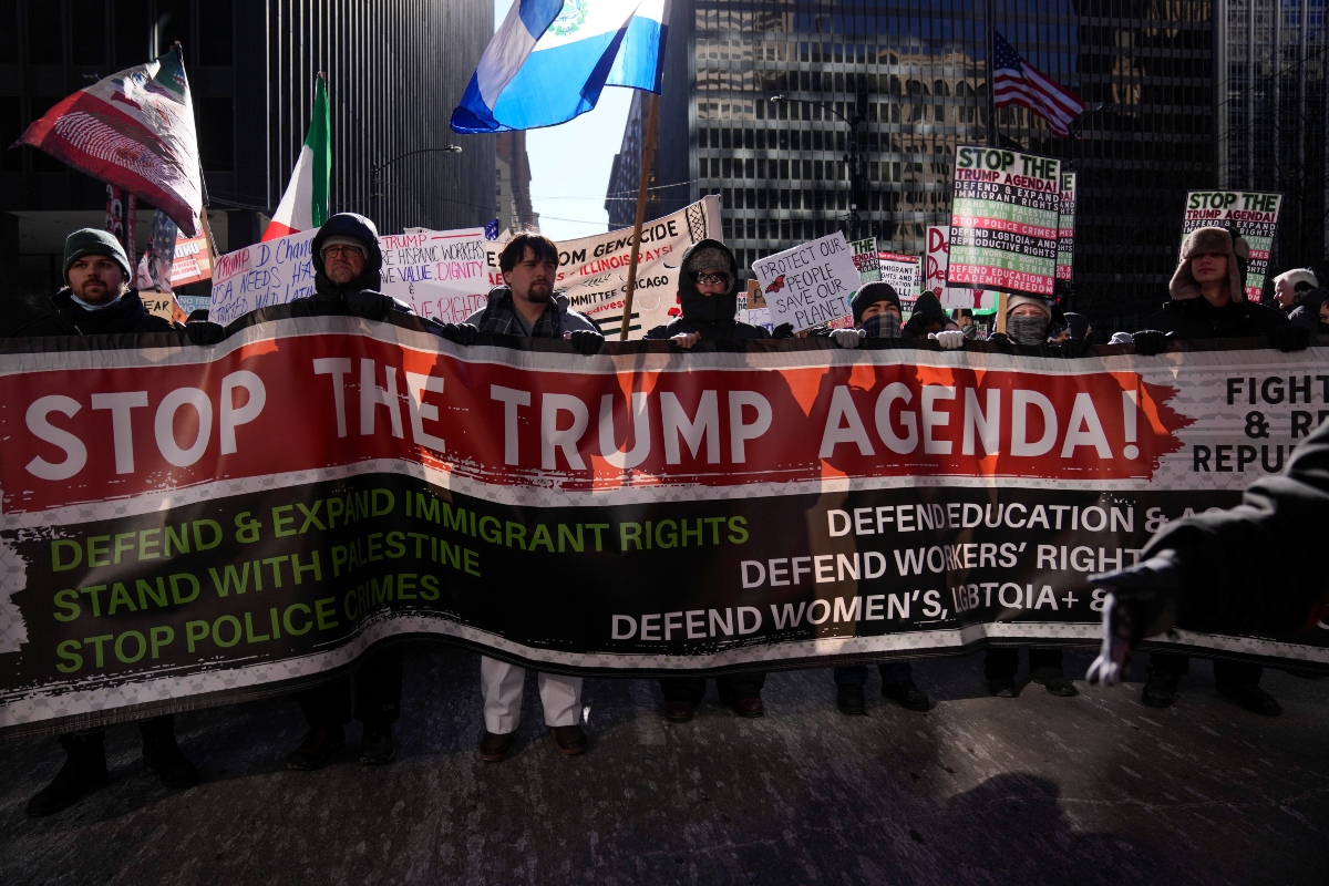 FILE - Anti-Trump protesters march to Trump Tower as they rally for a number of issues, including immigrant rights, the Israel-Hamas war, women's reproductive rights, racial equality and others, on the day of President Trump's Inauguration, Monday, Jan. 20, 2025, in Chicago. (AP Photo/Erin Hooley,File)
