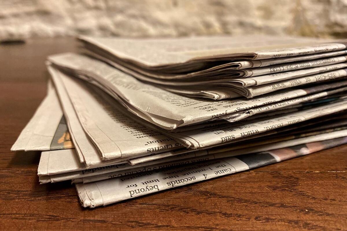 A stack of newspapers is pictured at the Illinois State Capitol. (Capitol News Illinois file photo)