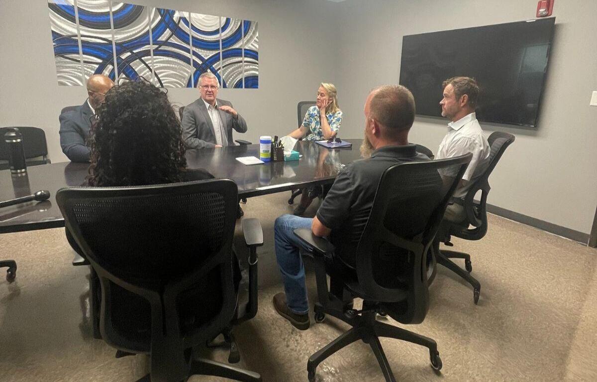 Rep. Nikki Budzinski meets with local leaders in Champaign.