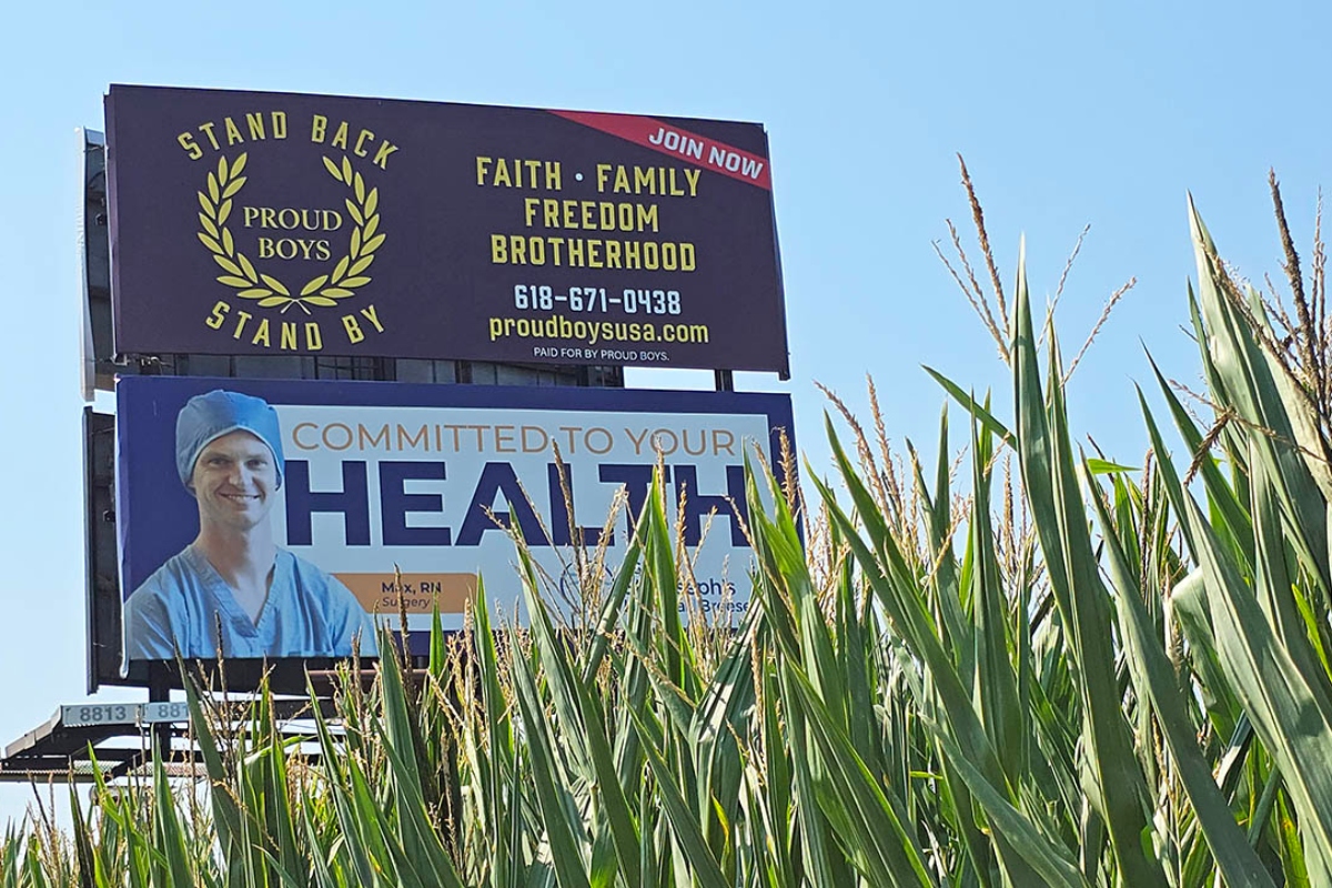 A billboard promoting the Proud Boys, a right-wing extremist group, appears in a cornfield in Clinton County, Illinois. (Molly Parker/CNI)