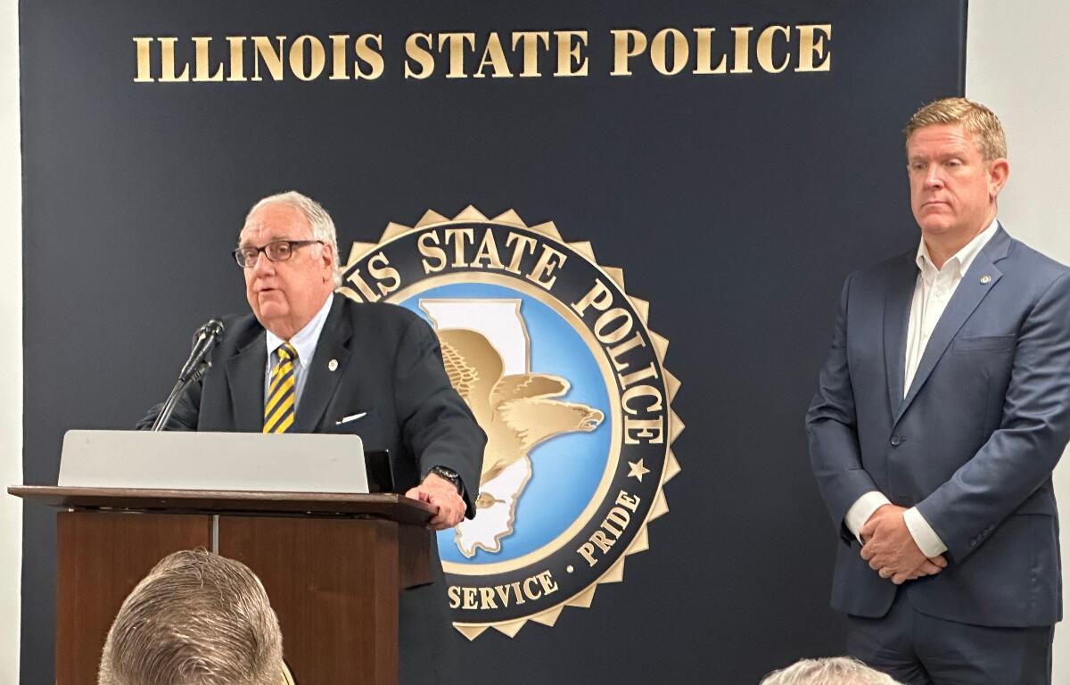 Illinois State Police Director Brendan Kelly, right, and investor Howard G. Buffett, participate in a news conference on human trafficking Wednesday in Decatur.