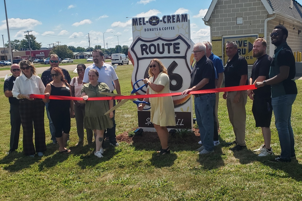 The new Route 66 donut sign was the subject of a ribbon-cutting Wednesday outside Mel-o-Cream on 6th Street.