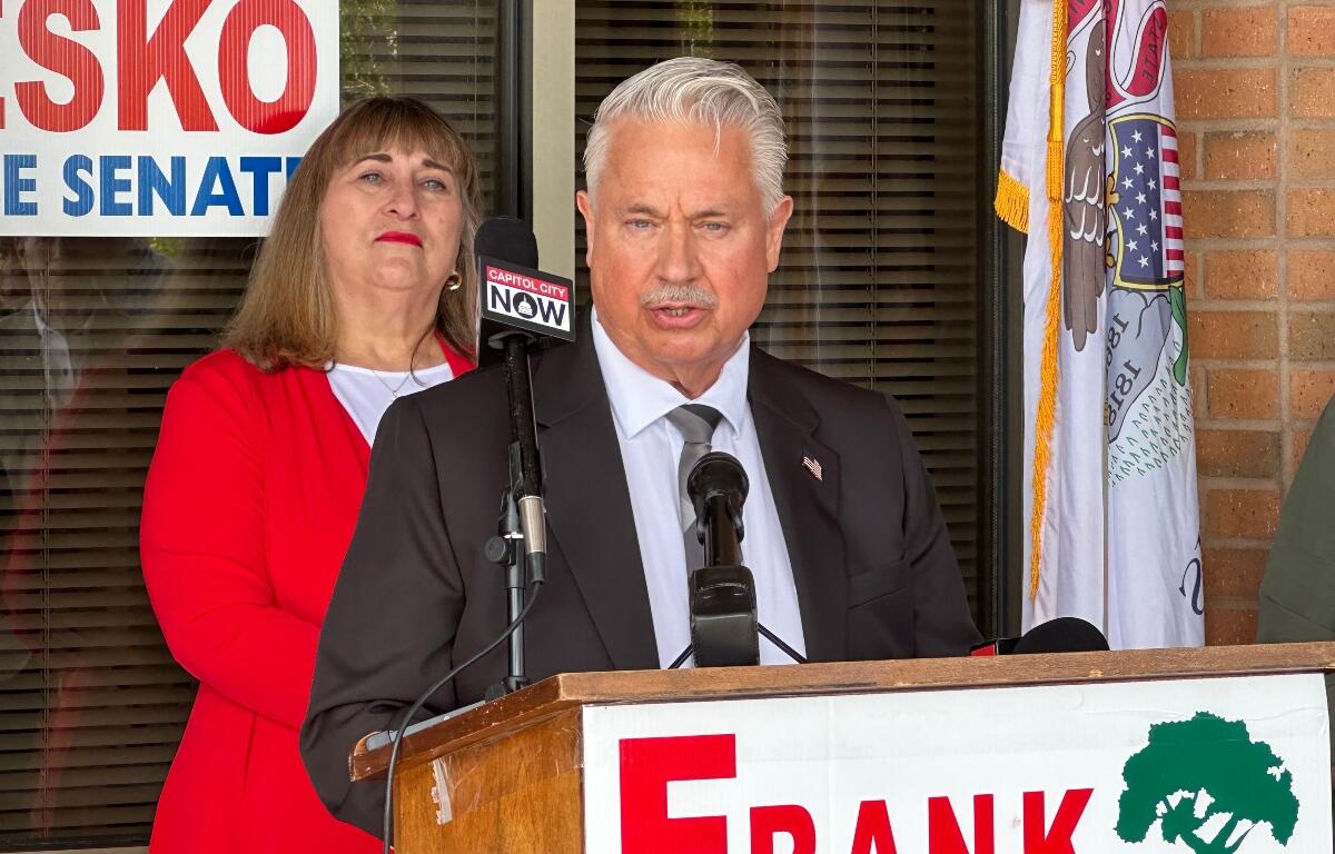 Frank Lesko, State Senate candidate, makes his campaign announcement Tuesday as Dianne Barghouti Hardwick, Sangamon County Republican Party Chair, looks on.